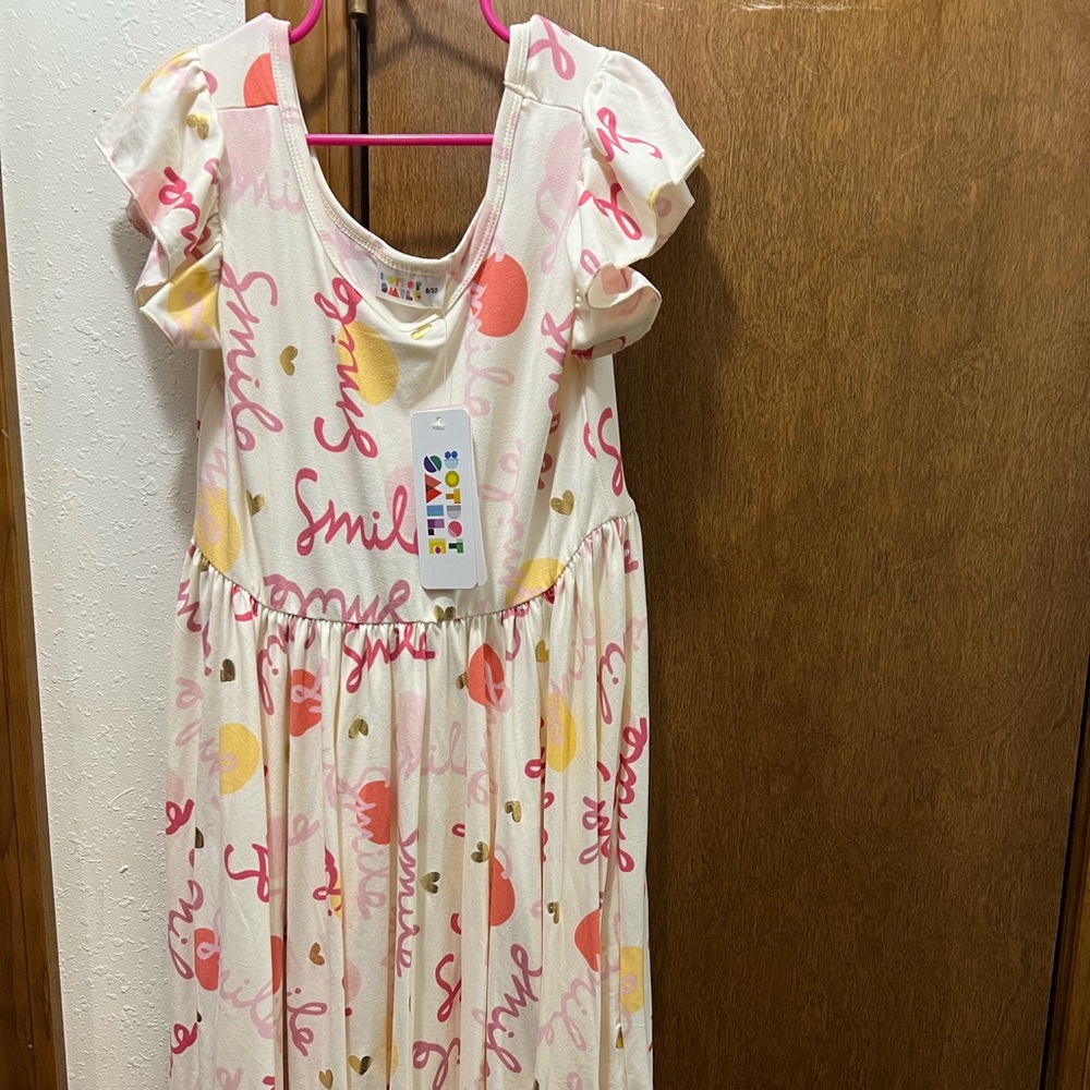 Brand new with tags Dot dot smile dress size 8/10